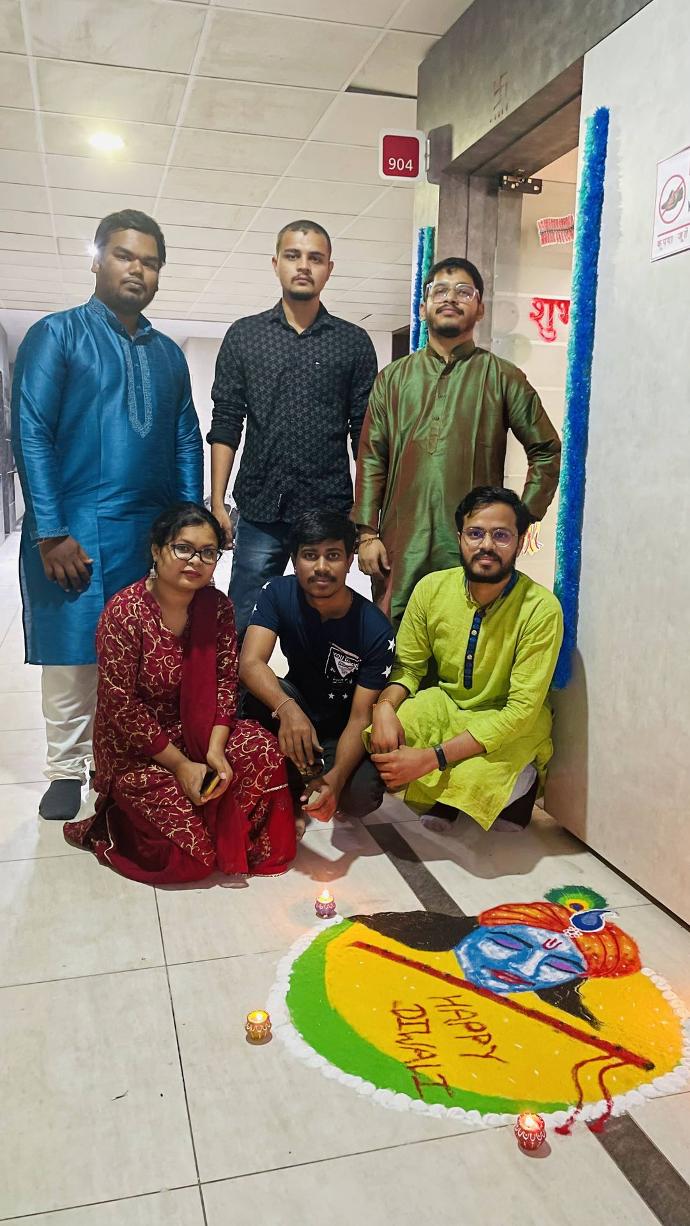 Group Photo With Rangoli